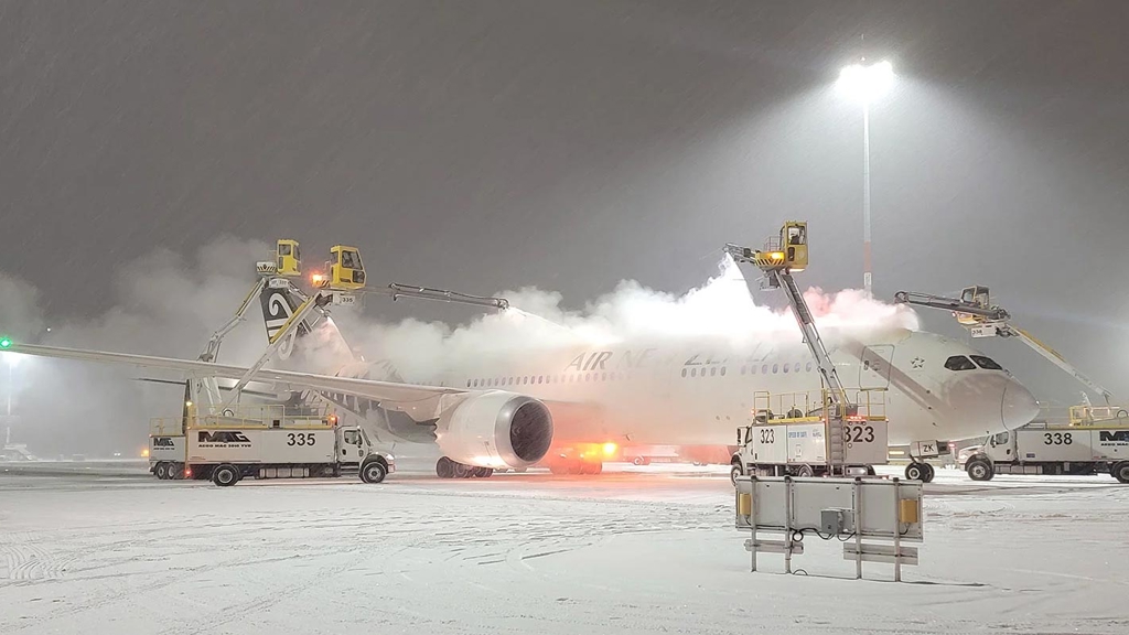 Plane being de-iced