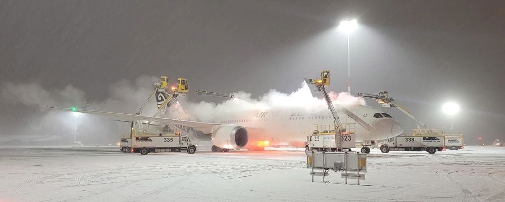 Plane being de-iced