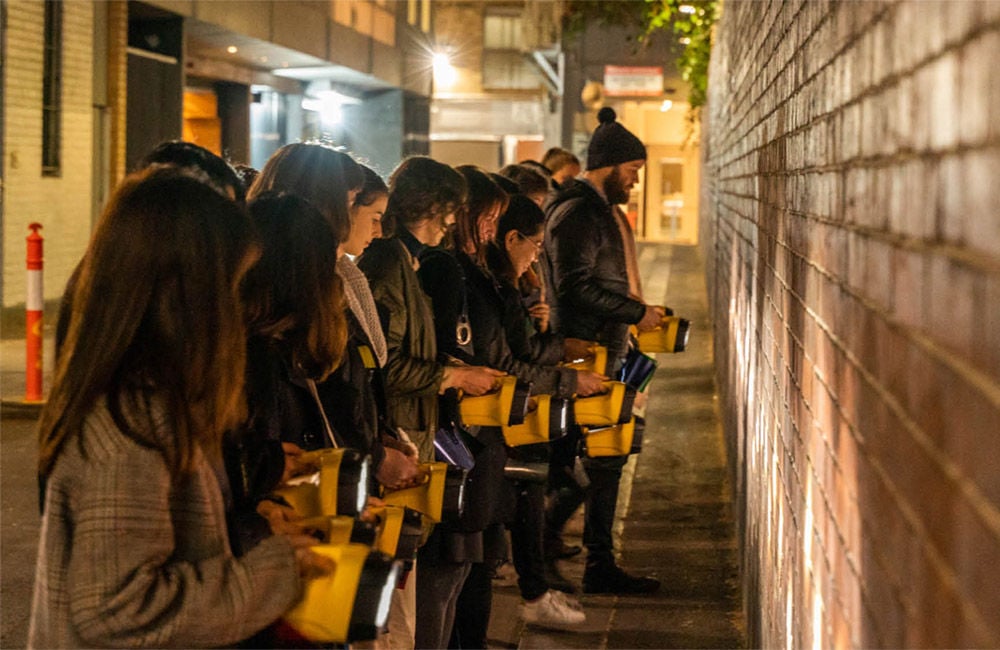 People undertaking nighttime vulnerability assessment