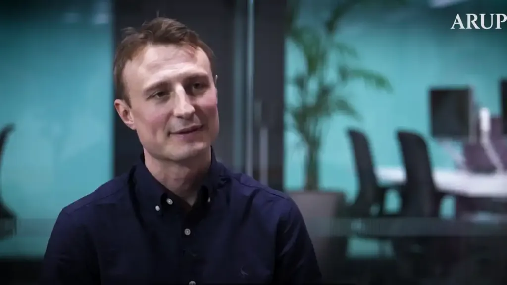 A man in a black shirt.
