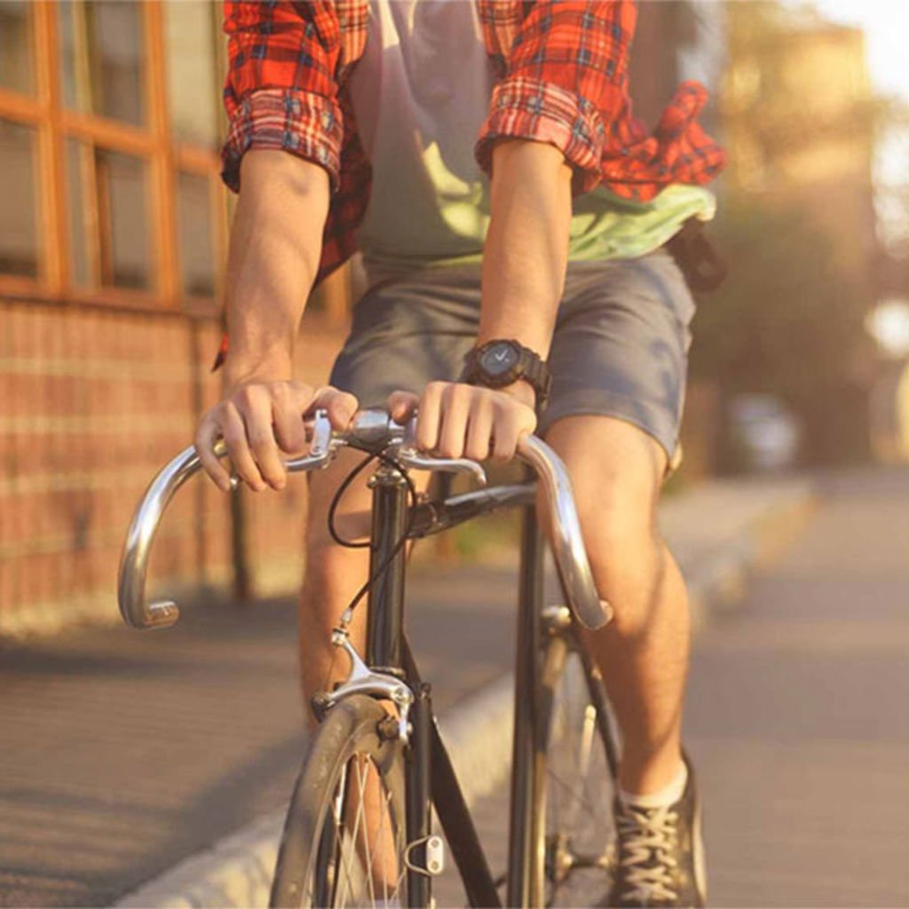 Person cycling in a city